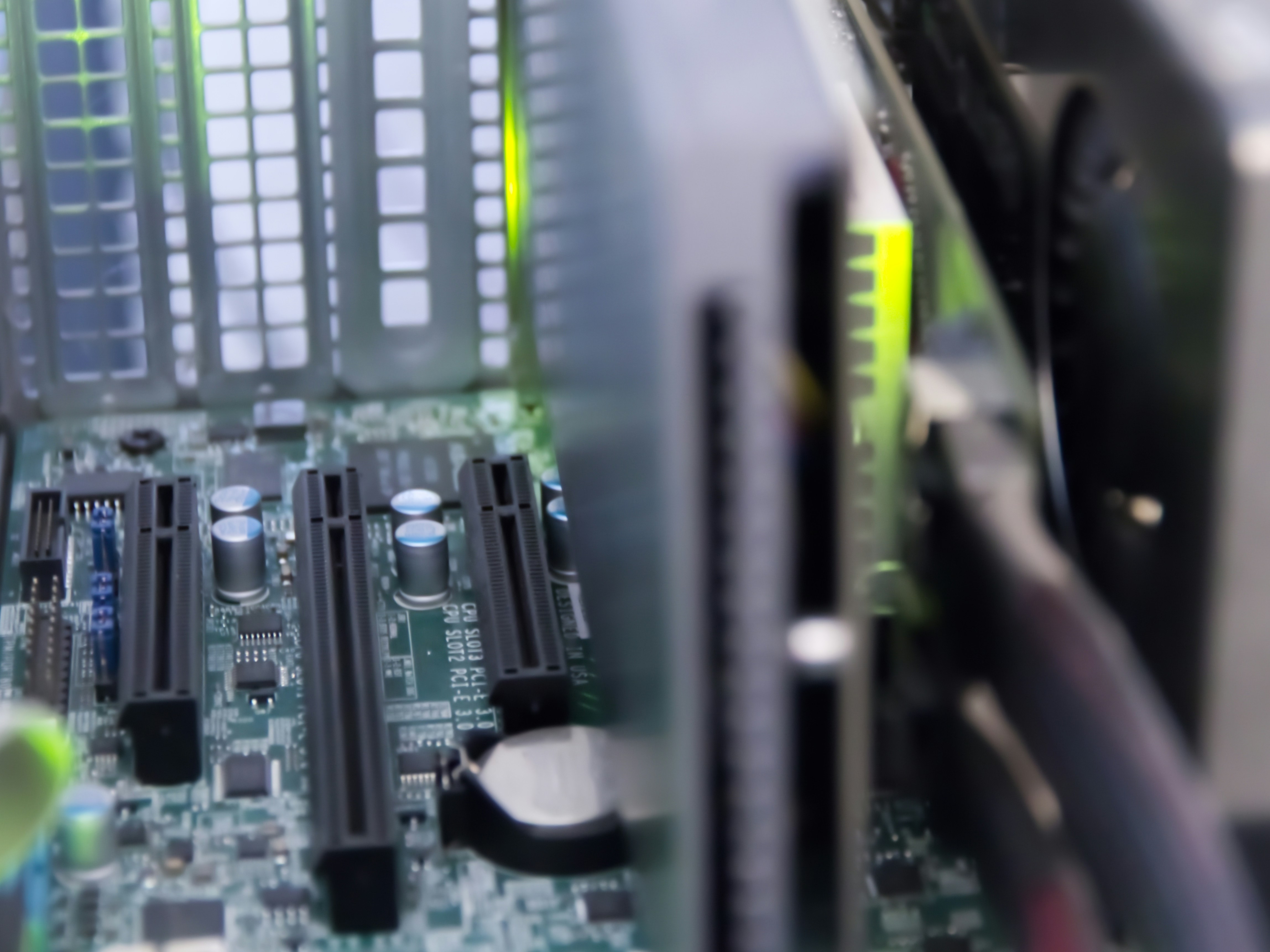 Picture the PCIe slots of a server and its extension cards
